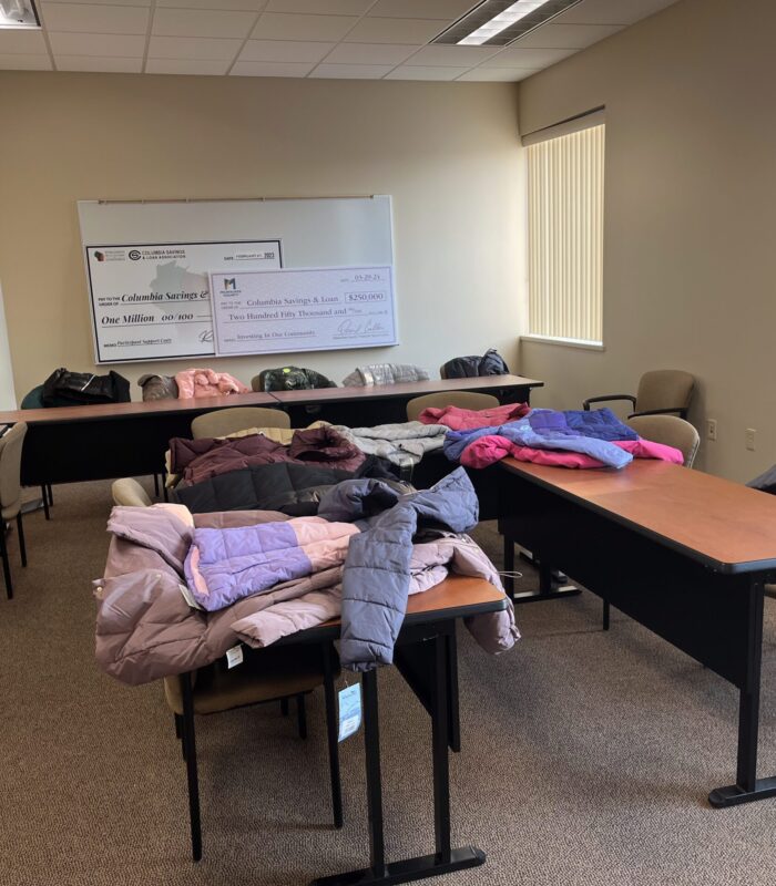 IMG_8573 image of room with coats on tables