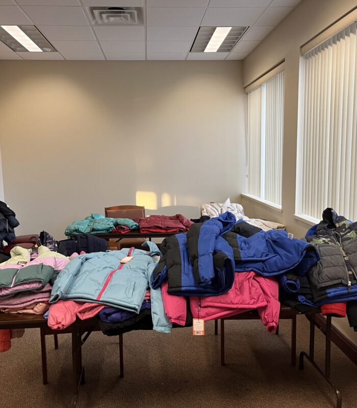 IMG_8574 image of room with coats on a table