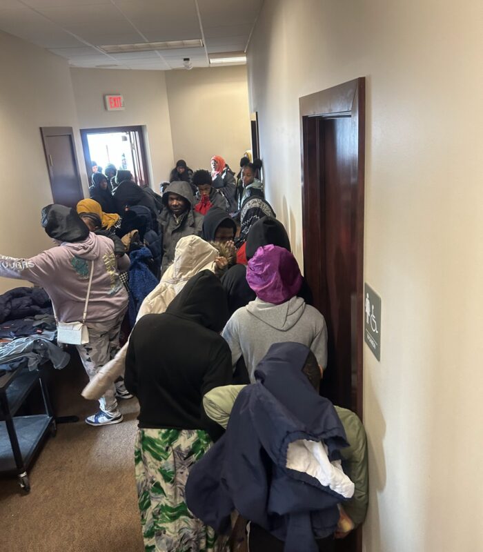 IMG_9279 image of people standing in a hall